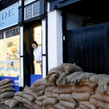 Marketing flood risk adaptation to small businesses and households