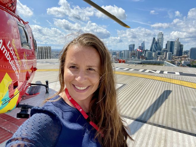 Photo of student Philippa Esson in front of an Air Ambulance