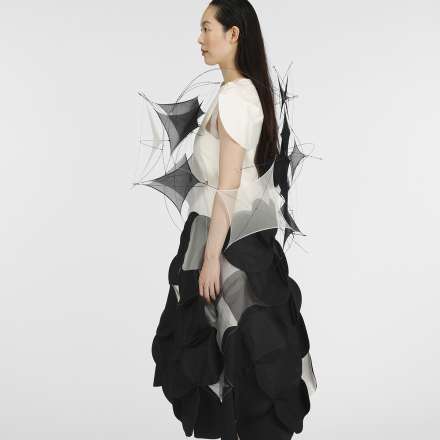 The geometric shapes in Zhen Tian's collection are inspired by architectural structures. 