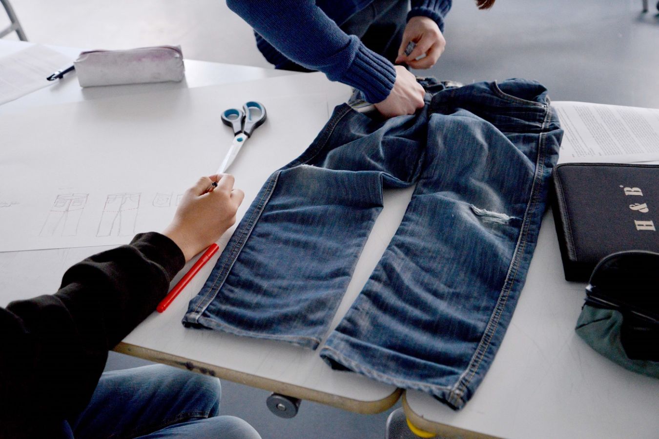 Pair of jeans being upcycled