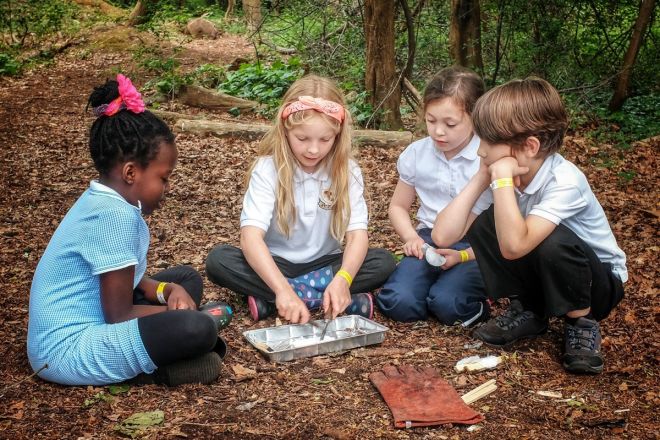 Creating campfires using sticks is one of the many activities the school pupils get to try.