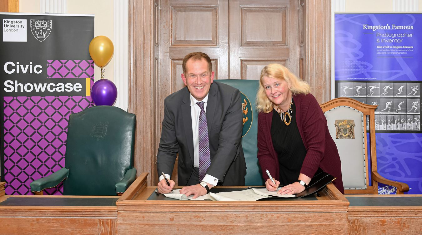 Council Leader Liz Green and Kingston University Vice-Chancellor Professor Steven Spier sign the memorandum of understanding at the University\'s civic showcase event at the town\'s Guildhall on Monday night.