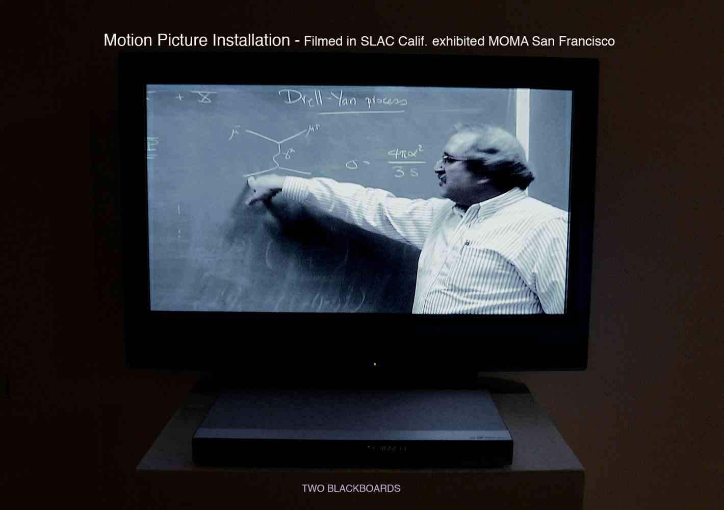 'Two Blackboards' 45min (Research) Motion Picture Installation as continuous projection loop. First shown MOMA San Francisco - In Collaboration with Michael Peskin, Head of the Theory Division, SLAC Stanford. What is Dark Energy? How many colours in a quark?