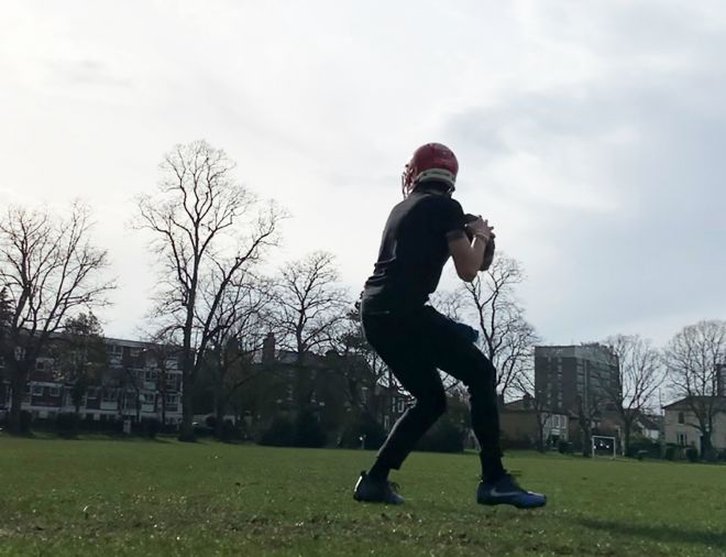 Max Baker playing American football