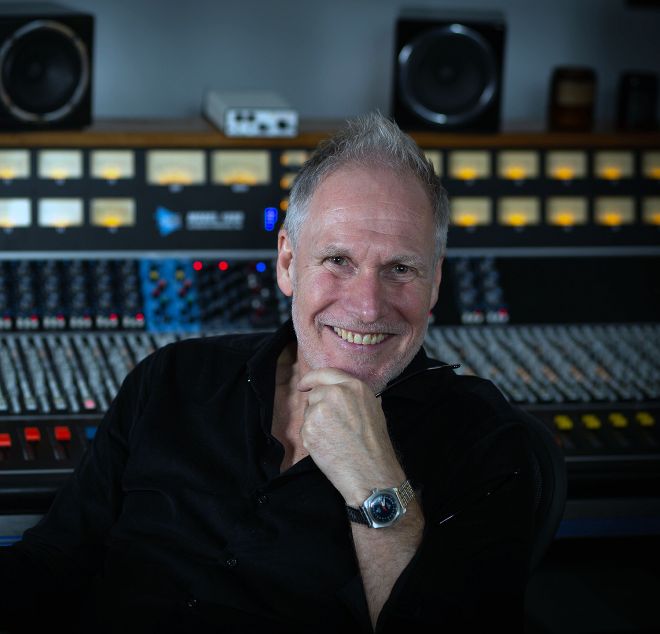 Walker's producer and collaborator Peter Walsh will be in attendance at the symposium.