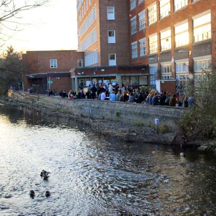 As the sun goes down by the side of the Hogsmill River