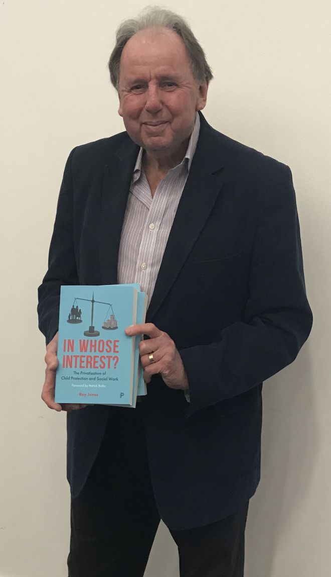 Professor Ray Jones with his newly-published book