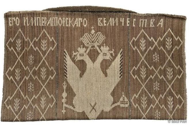 Grass bag with Russian emblem on it