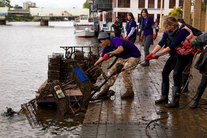 Volunteers help at the big river clean up in Kingston at the Thames