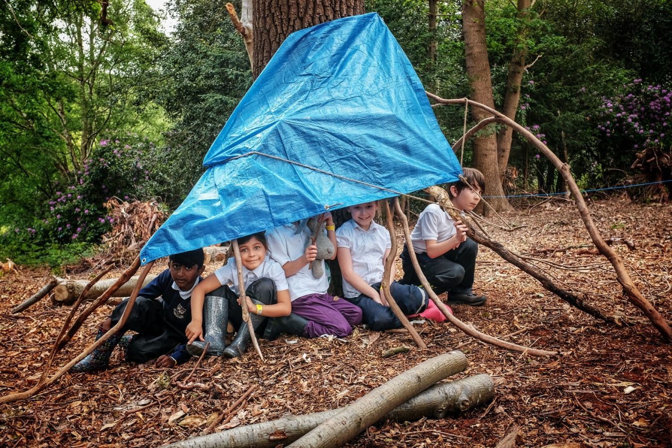 The pupils also learned how to create shelters using woodland material and tarpaulin.