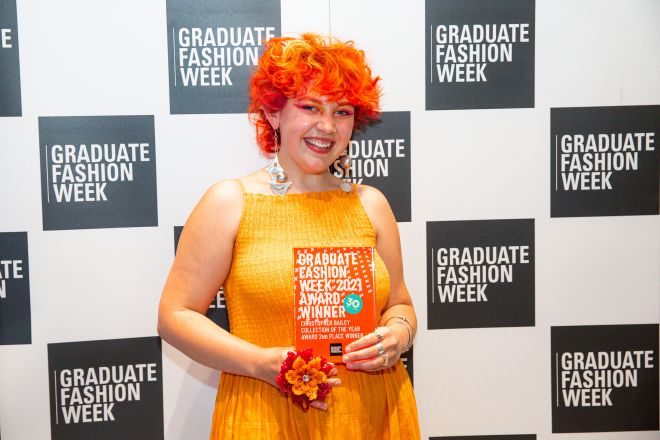 Darcie Hancock collecting her award at Graduate Fashion Week