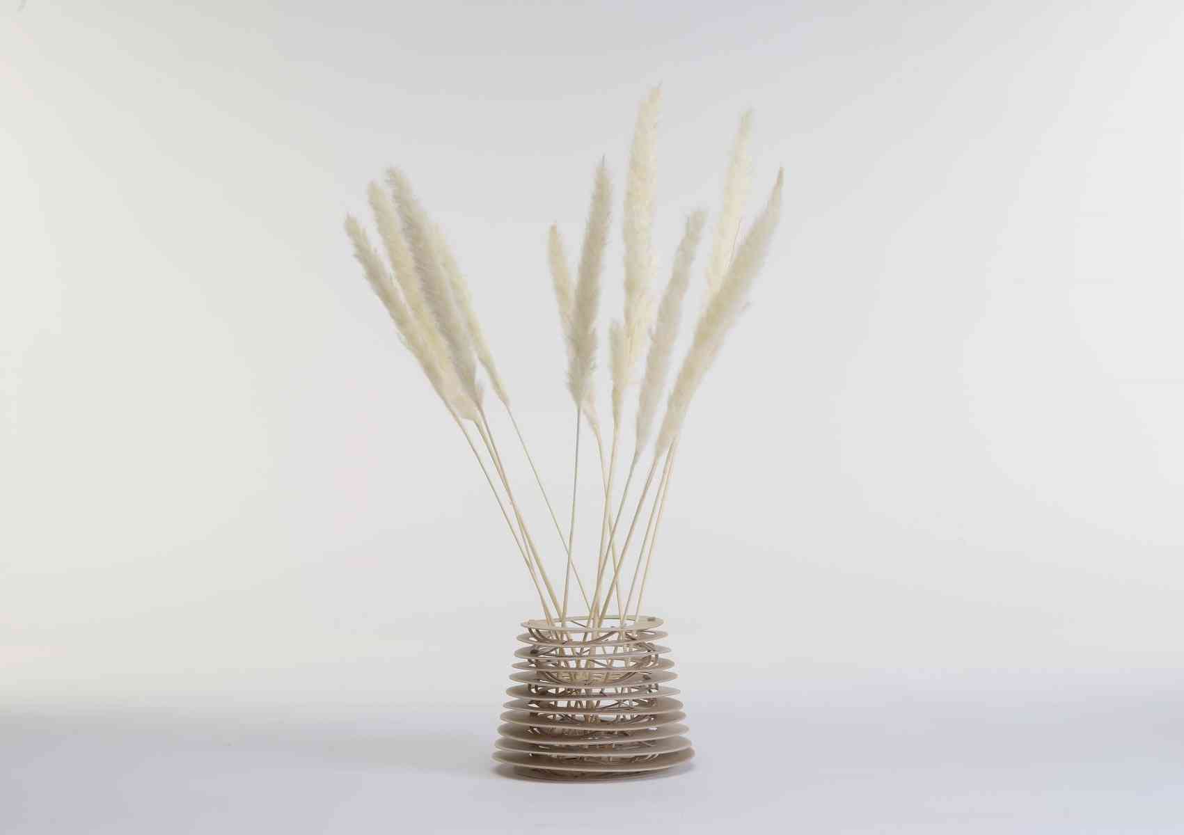 James Fender: Digital cut plywood vase - Flower vase made of aero plywood sheets using digital cutting process.