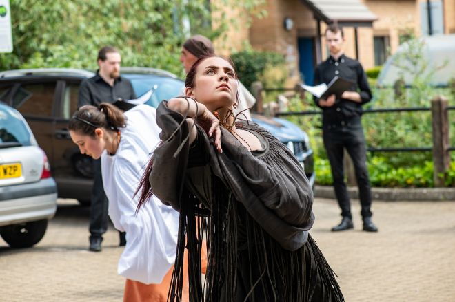 Dance students performing The Origin