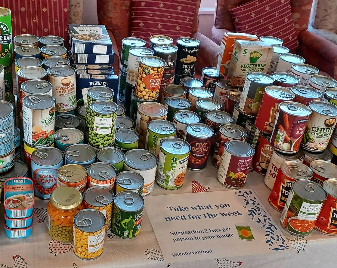 A table full of tinned food.