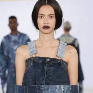 Kingston University designer's sustainable fusion of denim and African fabrics modelled at Graduate Fashion Week by industry icon Caryn Franklin