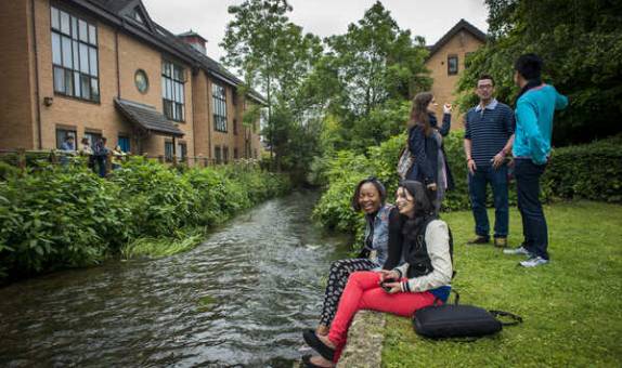 Students hanging out on accommodation grounds