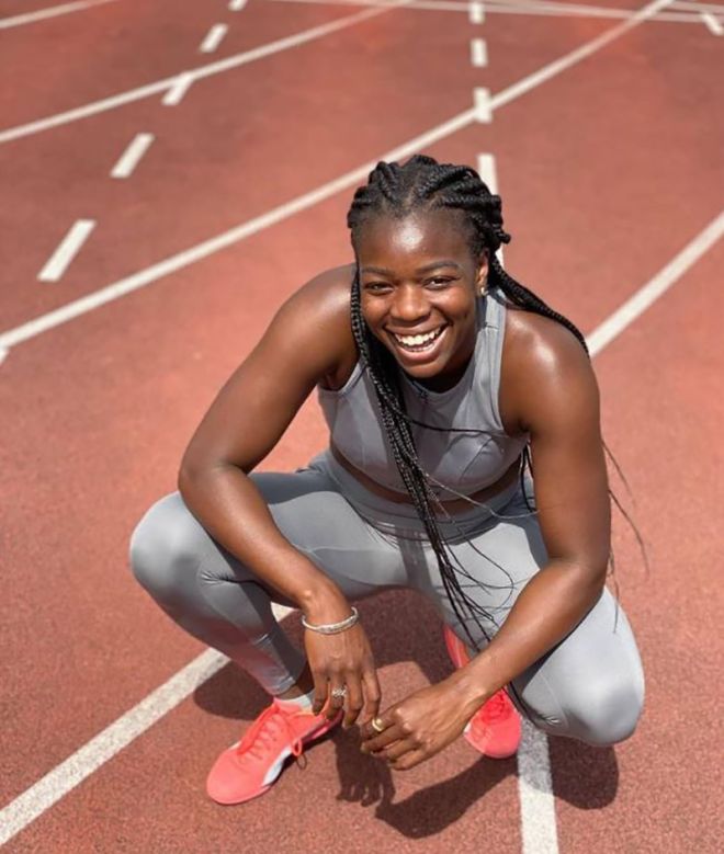 Photo of Asha Philip on running track