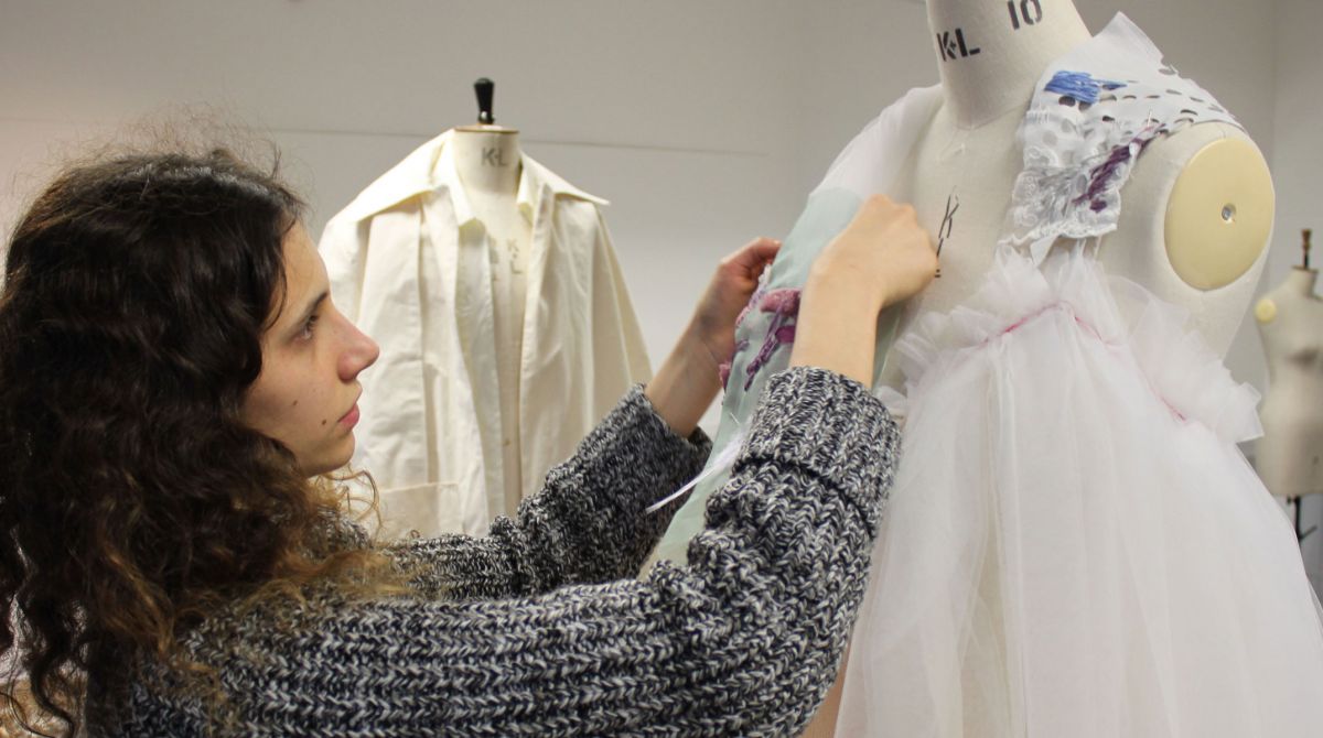 Visually impaired fashion student brings braille together with couture to create graduate collection