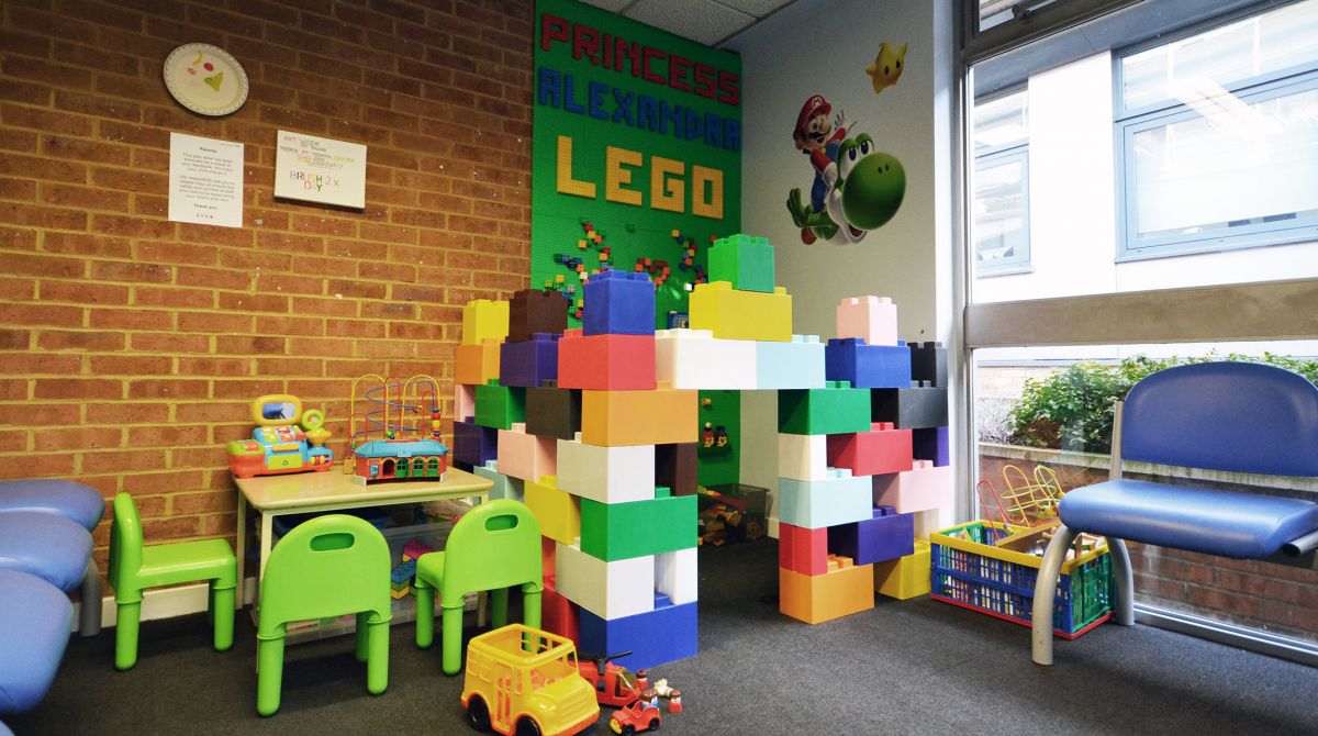 Kingston University graduate revamps hospital waiting room with 11kg of Duplo Lego to bring colour and positivity to patients