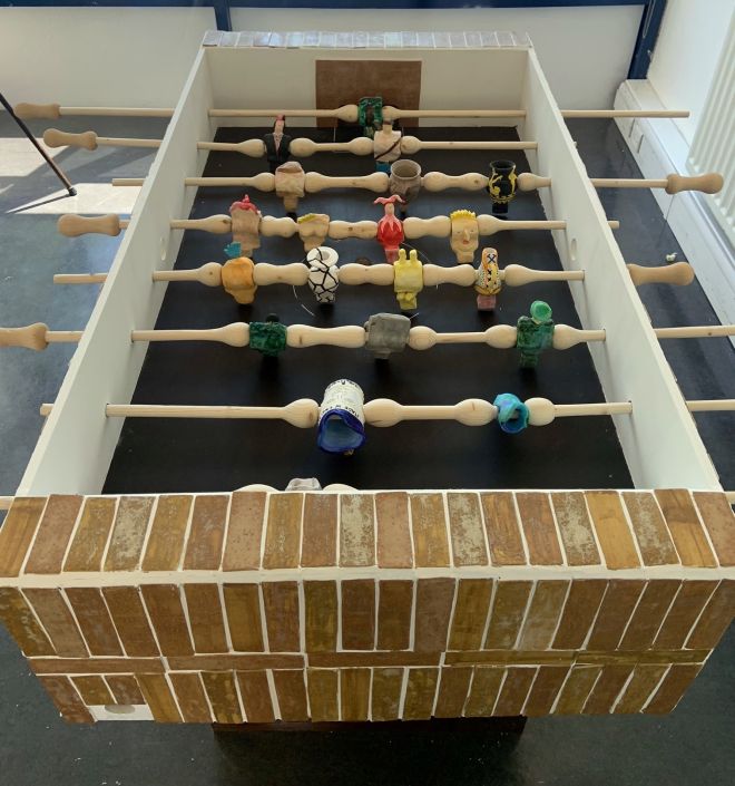 Fine art student Ieuan James's foosball table features historical features of ceramic art.