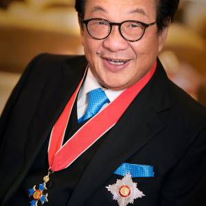 Kingston University alumnus Tan Sri (Sir) Francis Yeoh receives Queen's knighthood (KBE) at Clarence House