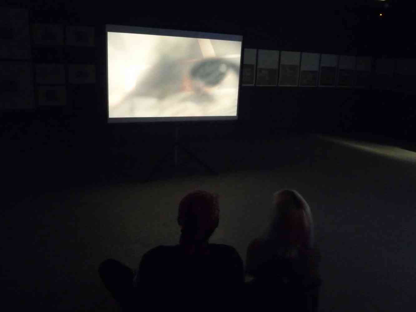 Viewing final work at teh Drawing Room Gallery - Students watching their films projected at the end of the Drawing Room Collaboration