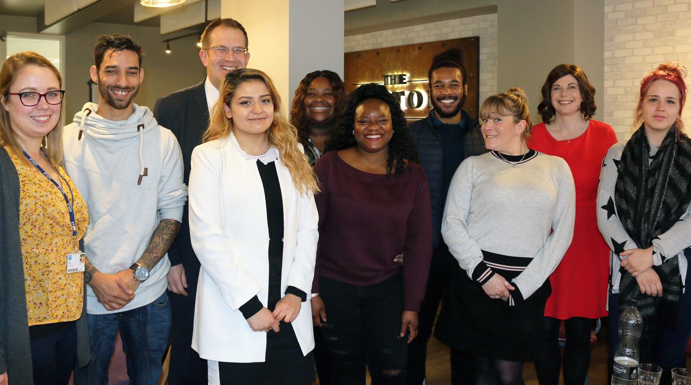 Vice-Chancellor Steven Spier with staff and students from the KU Cares scheme.