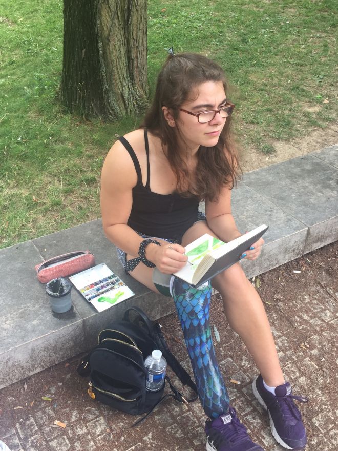 Illustration and animation student Sophie Kamlish taking a break from training to do some sketching in Paris' Parc De Bercy.