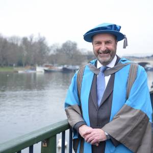 Former Kingston Council chief executive Bruce McDonald, who brought Rose Theatre and Olympic cycling to borough, receives honorary degree