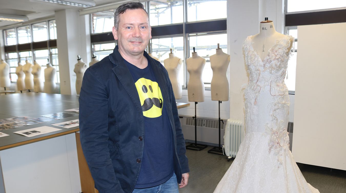 Fashion lecturer Paul Simonson with his design for an alternative wedding fress for Meghan Markle, inspired by the Cambodian temples of Angkor Wat. 