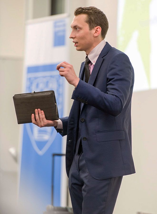 Photo of Sam Nozdrachov from Samuel L Notebooks speaking at the event.