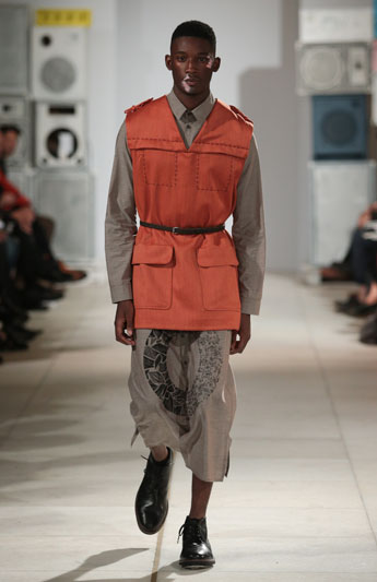 Barry Jude combined sharp tailoring with flowing,heavily embroidered shrts.