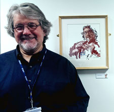 Senior lecturer in mental health nursing Chris Hart next to his likeness created by Alban Low.