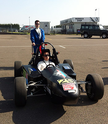 Drivers Andy Ng (sitting) and Chris Grzebien (behind)
