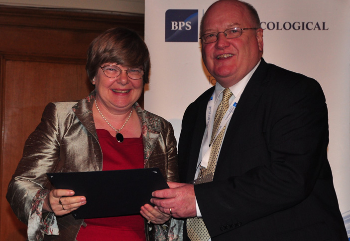 Professor Edith Sim, left, is congratulated on her outstanding contribution to scientific research by British Pharmacological Society President Professor Philip Routledge.  