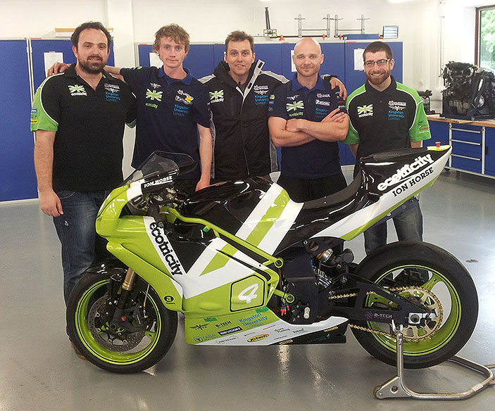 Principal lecturer Paul Brandon, centre, with the student team who helped build the Phoenix electric motorbike.