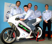 Engineering students (from left to right) Dean Goldsmith, Michael Payne (sat on the bike), Sean Whittaker, Alex Jones-Dellaportas and Gonzalo Carrasco with the green bike.
