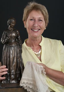 Conference organiser Carol McCubbin shows off a bronze Nightingale statue and lace that belonged to ‘the lady with the lamp’.