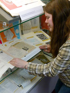 University archivist Katie Giles with the Cary Ellison theatre programme collection.