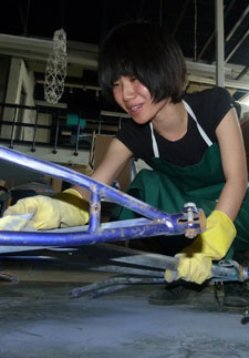 Chen Ying Gao at work on her design in the studios at Kingston University.