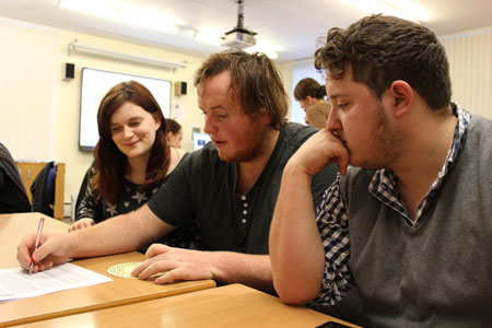 Students Josie Murray, Alistair Smith and Alastair Crow testing out some of their teaching materials.
