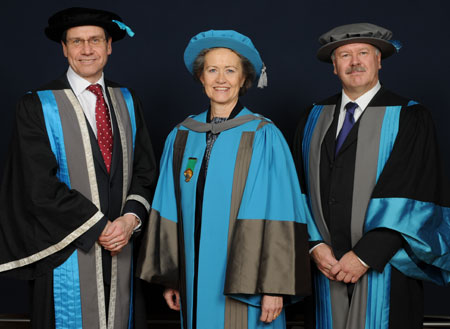 Pro Vice-Chancellor for Corporate Affairs and University Secretary Neil Latham, left, and Professor Tim Ellis, right, congratulate Elizabeth Sparrow on her honorary degree.