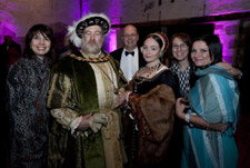 Henry VIII and Catherine Howard lookalikes with delegates at the national conference gala dinner at Hampton Court Palace 