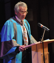 Peter Bishop addresses graduates from the Faculty of Art, Design and Architecture at the Rose Theatre.