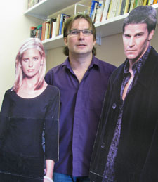 Professor Pateman has cardboard cut-outs of Buffy and Angel in his office.