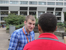 Youth worker Tom Issac talks to a young person as part of the project at St Thomas' hospital. 