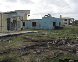 Australia's Tully Heads succumbed to extensive wind and storm surge damage when Cyclone Yasi struck.