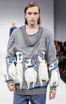 One of the jumpers in Zac's collection is covered with lightly padded knitted characters. 