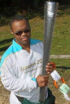 David Stanley was nominated to take part in the Paralympic torch relay for his work promoting the rights of people with learning difficulties.