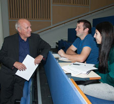 Greg Dyke, who ran the BBC from 2000 to 2004, talks to Kingston University journalism students following his lecture.